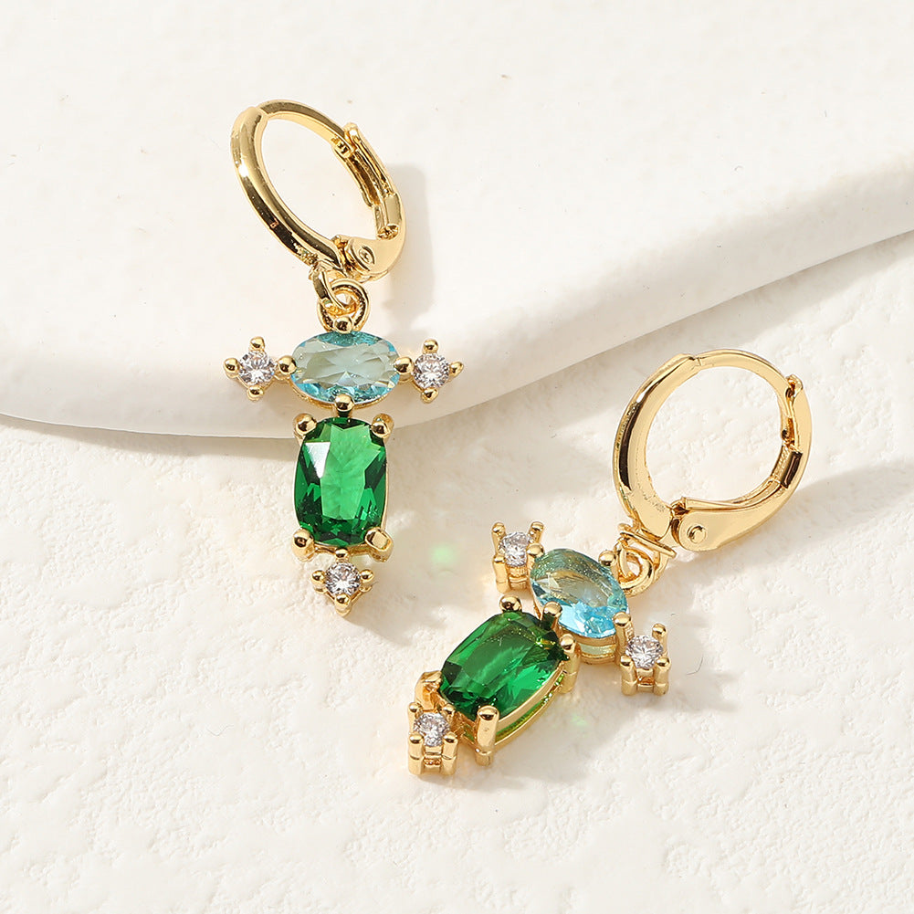 Pendientes de Ojos de Oro Real Gold Devil de cobre al por mayor de cobre